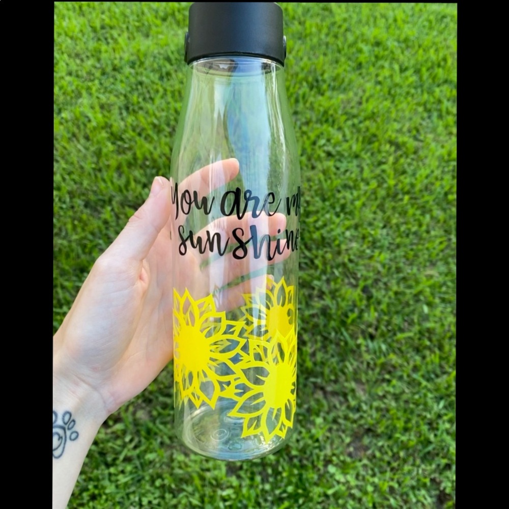 Plastic water bottle w/ permanent vinyl sticker🌻
